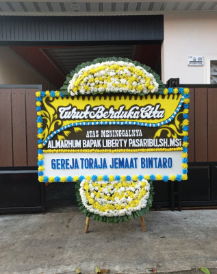 Papan Bunga Duka di Sumay